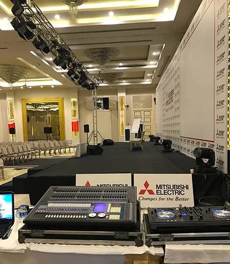 Professional live sound and stage control setup featuring audio mixing consoles, stage lighting and truss systems for a corporate conference event in Antalya, Bodrum and Cappadocia