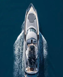 Luxury superyacht rental in Turkey viewed from above while cruising on crystal clear blue waters