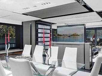Luxury yacht dining area in Gocek, Turkey featuring elegant indoor dining and a premium private yacht charter experience