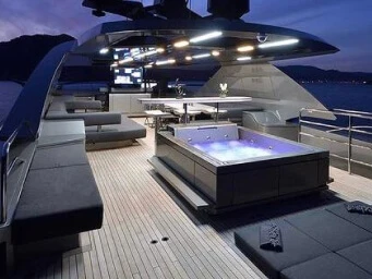 Luxury yacht rental in Bodrum, Turkey featuring a private jacuzzi deck, elegant lounge area and premium yacht charter experience