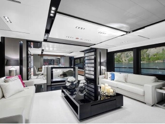 Luxury yacht lounge in Gocek, Turkey featuring a stylish living area with panoramic sea views and an exclusive private yacht charter experience