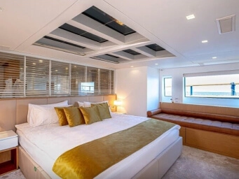 Luxury yacht master suite in Fethiye, Turkey featuring elegant accommodation, panoramic sea views and an exclusive private yacht charter experience